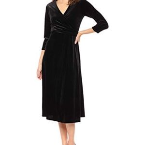 Chai’s black Velvet wrap dress with tag